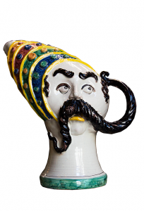 Man pitcher with ceramic hat