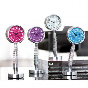 Orologio in metallo da scrivania  con molla glirtterato vari colori 22 cm