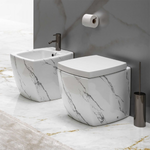 Back to wall toilet in ceramic marble Calacatta finish 