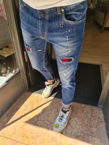 Jeans v2 tasca quadri e schizzi